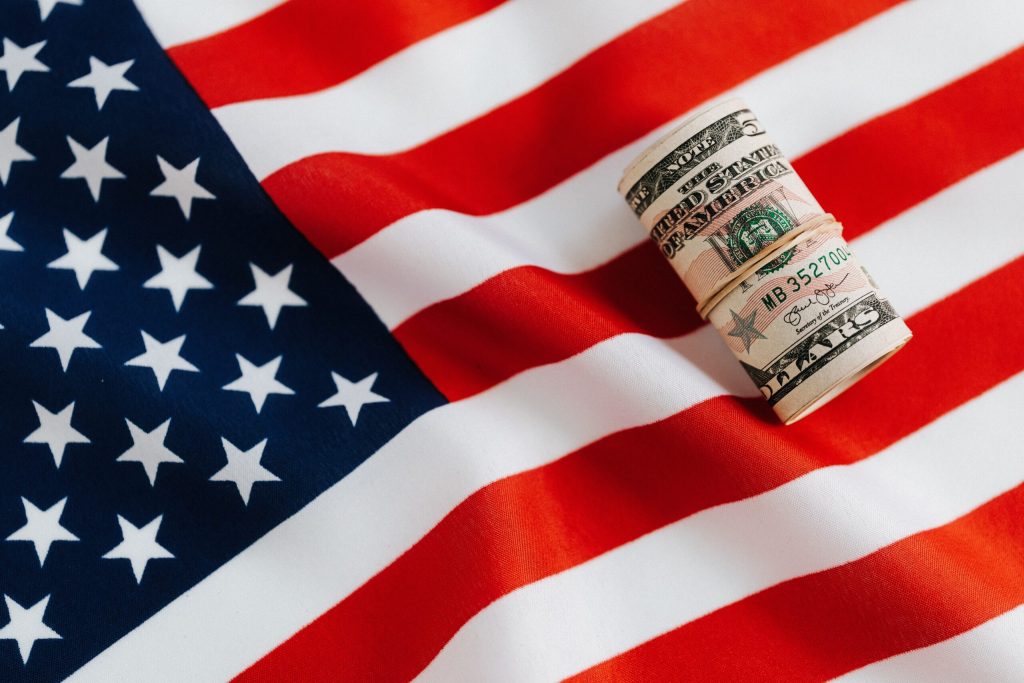 Spirits exports rebound after tariffs - money on US flag