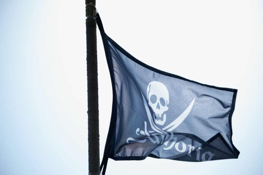 Yo-Ho! Pirate-Themed Event Pouring Rum to Raise Money for Charity - Jolly Roger flying in the wind
