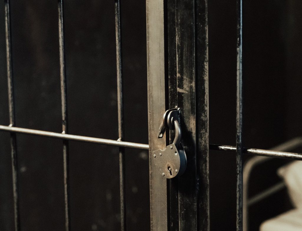 jail bars- Store accused of selling alcohol without a license