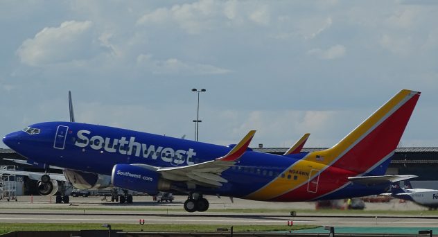 Watch: Drunk Passenger Allegedly Kicks and Bites Officers While Being Forcibly Removed from Plane