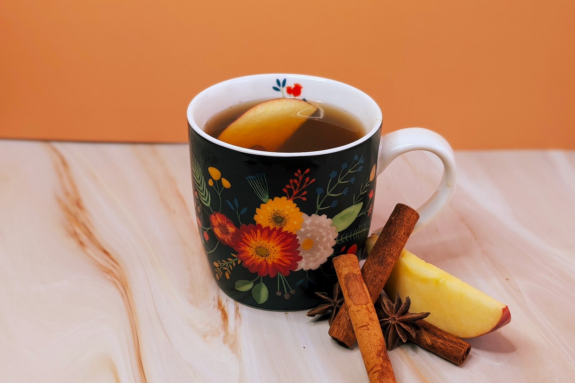 hot toddy cocktail in a mug with cinnomon; halloween cocktails
